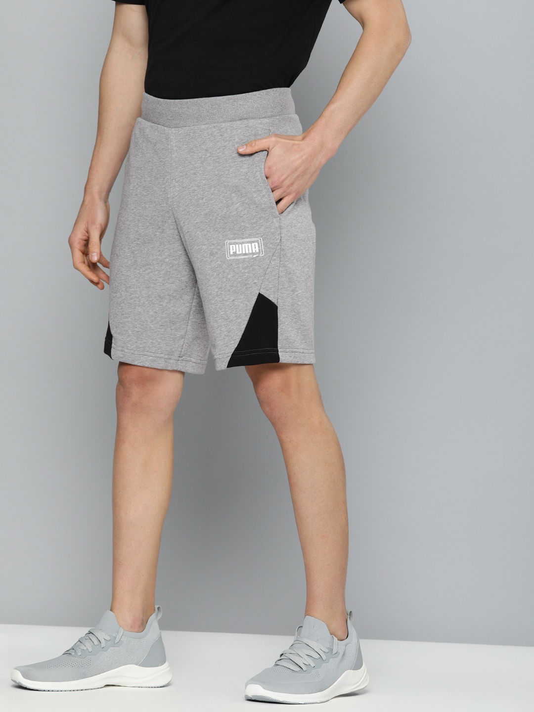 

Puma Men Grey Melange Solid Regular Fit REBEL 9" TR Sports Shorts
