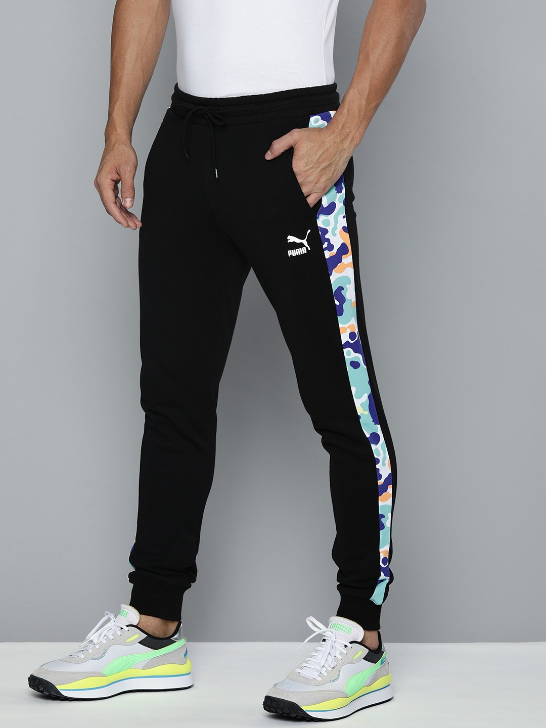 

Puma Men Black Slim Fit Solid Classics Graphics T7 Joggers