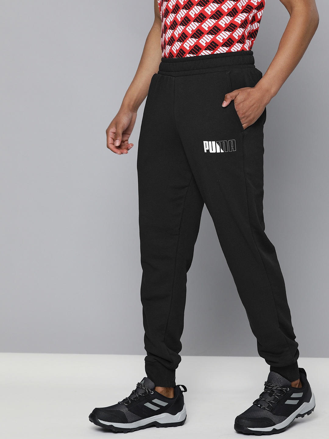

Puma Men Black Solid Graphic TR Joggers
