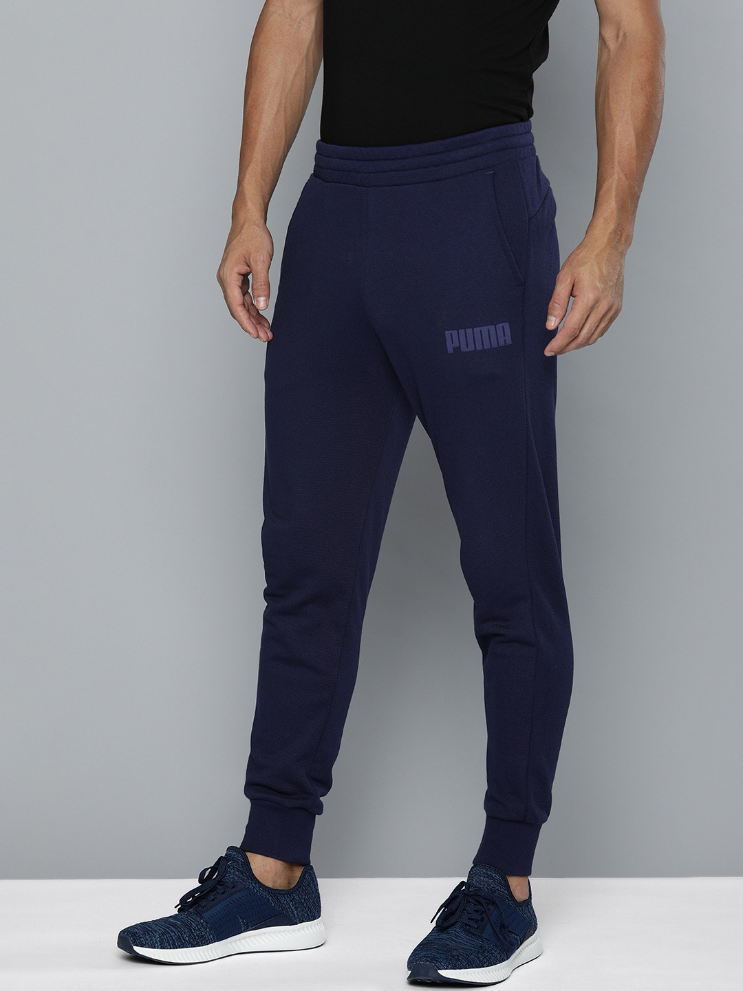 

Puma Men Navy Blue Solid MODERN BASICS Joggers