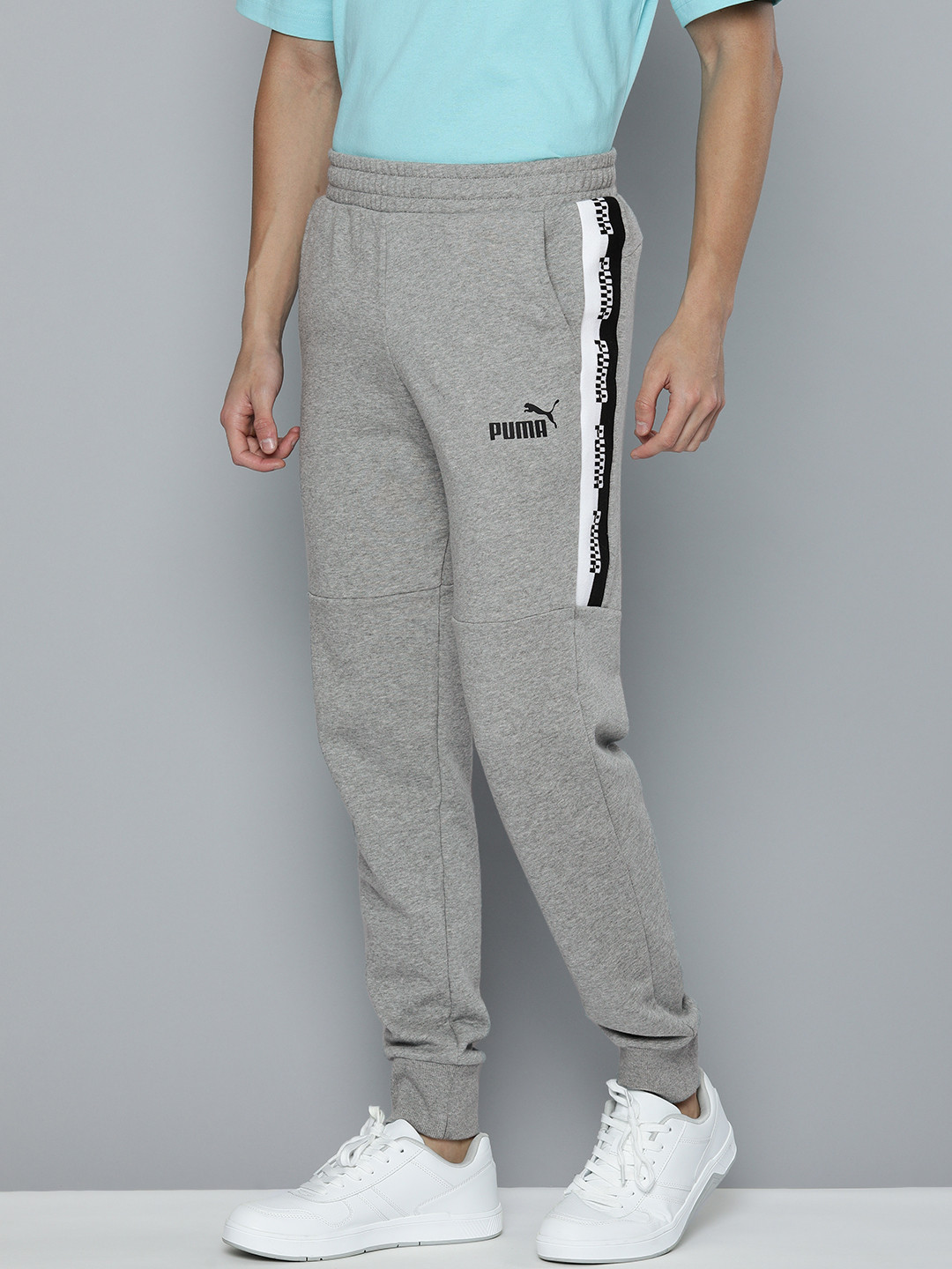 

Puma Men Grey Melange AMPLIFIED TR Solid Slim Joggers with Side Taping Detail