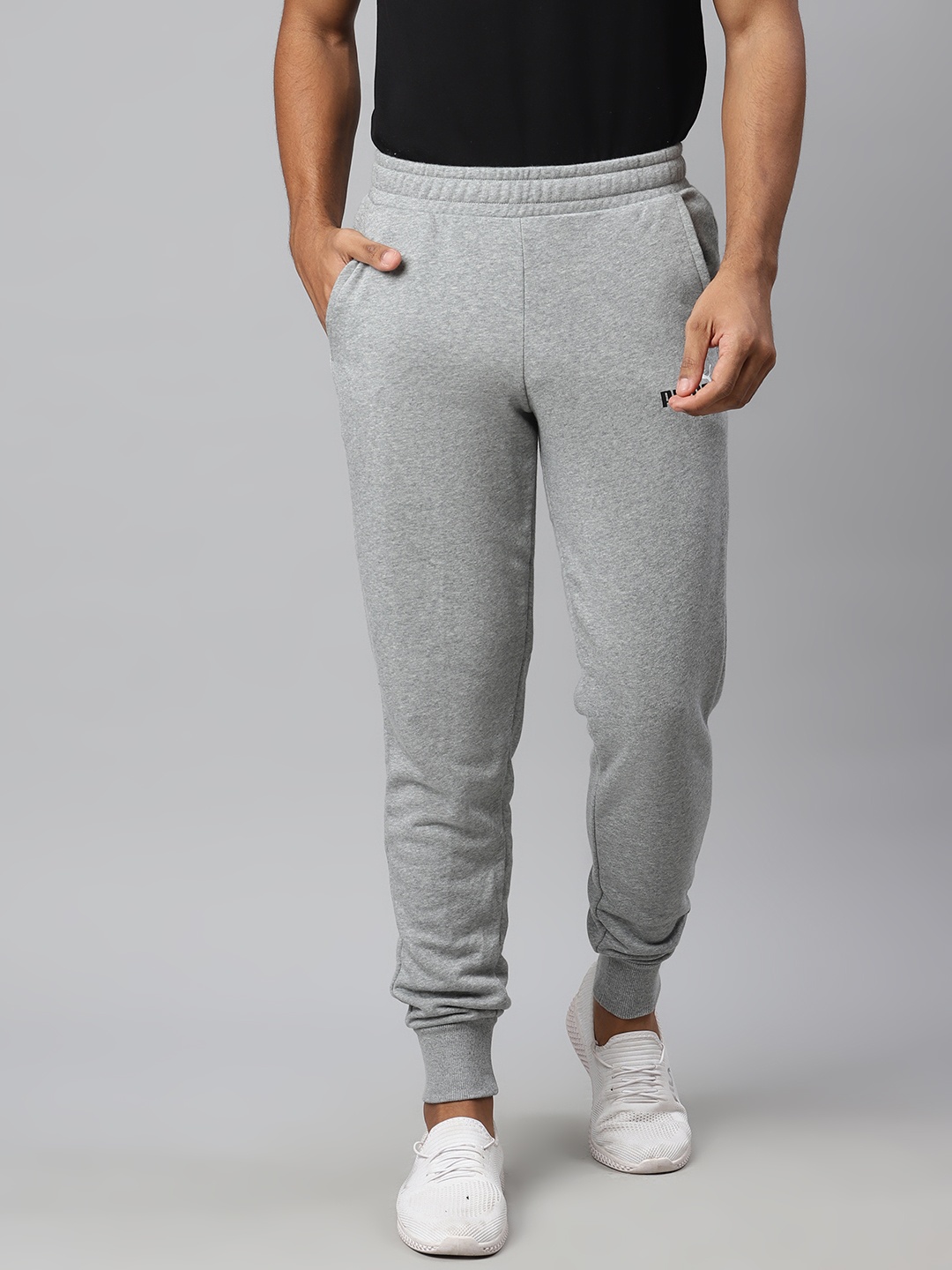 

Puma Men Grey Slim Fit Solid ESS+ 2 Col Logo TR cl Sustainable Joggers, Grey melange