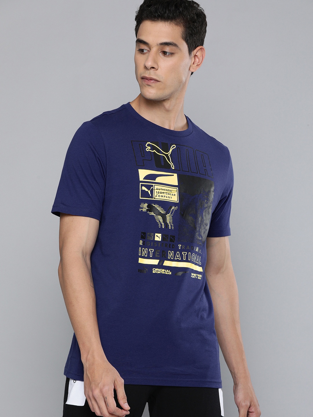 

Puma Men Navy Blue Printed Box Tee Round Neck Pure Cotton T-shirt