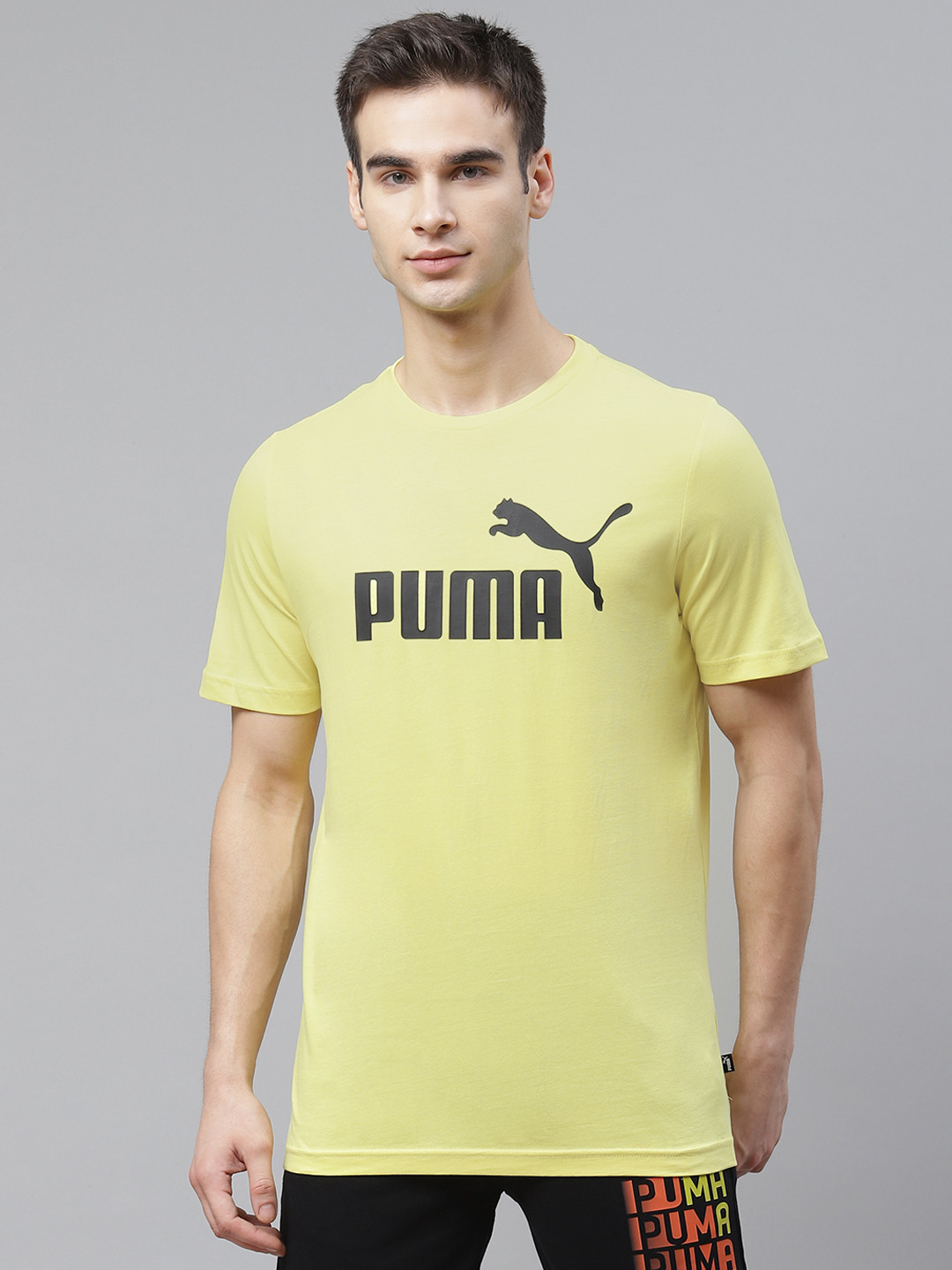 

Puma Men Yellow ESS Logo Print Pure Cotton T-Shirt