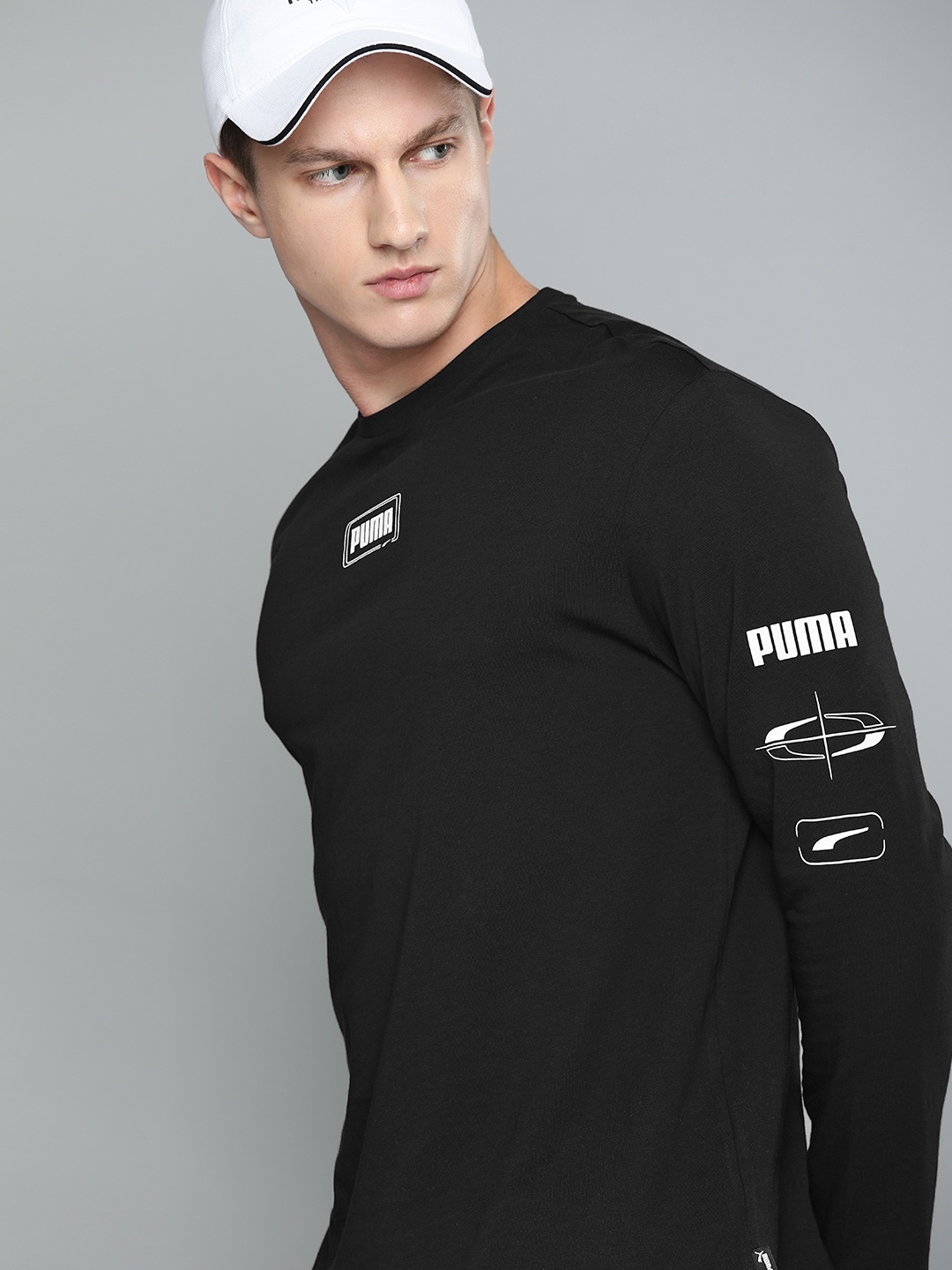 

Puma Men Black Solid Relaxed Fit Round Neck REBEL LS Pure Cotton T-shirt