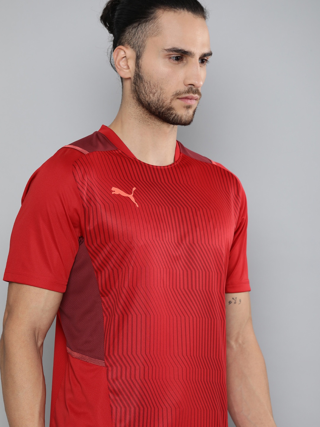 

Puma Men Red Striped teamCUP Graphic Round Neck Training Sustainable T-shirt