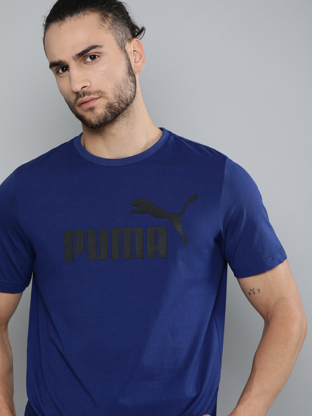 

Puma Men Navy Blue Black Pure Cotton ESS Brand Logo Printed Round Neck Pure Cotton T-shirt
