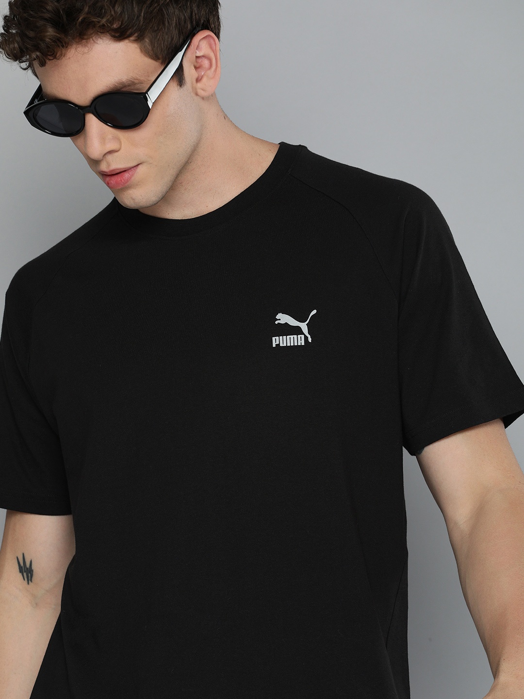 

Puma Men Black Solid Round Neck T-shirt