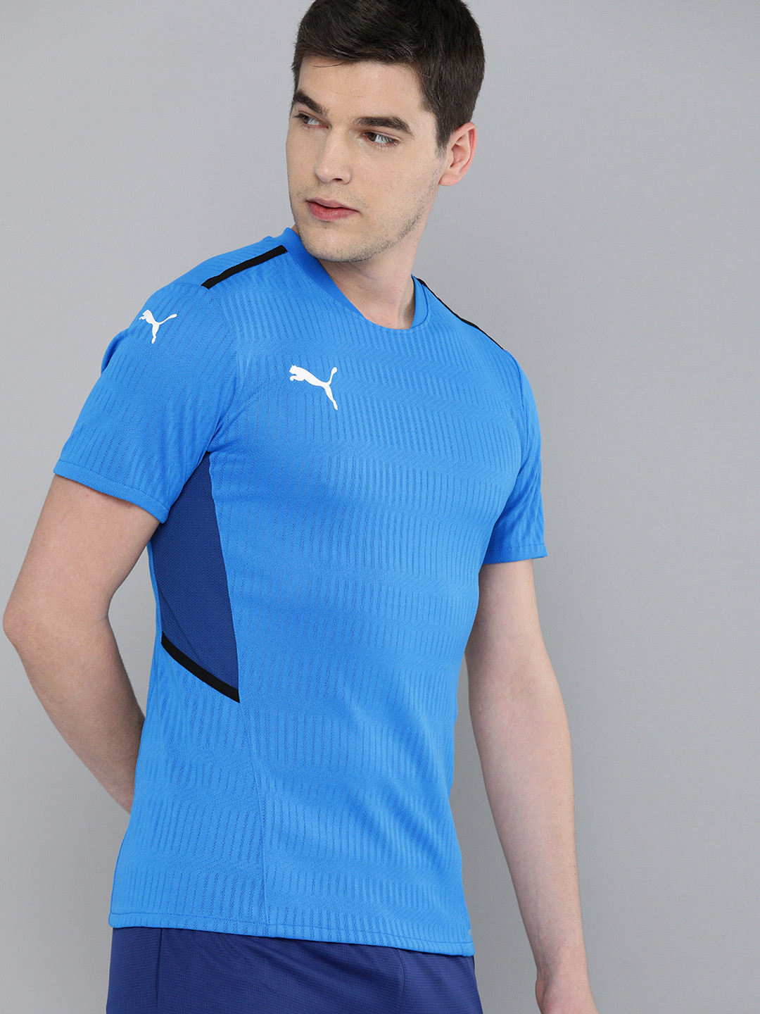 

Puma Men Blue Self Design Round Neck Team CUP Jersey Sustainable T-shirt