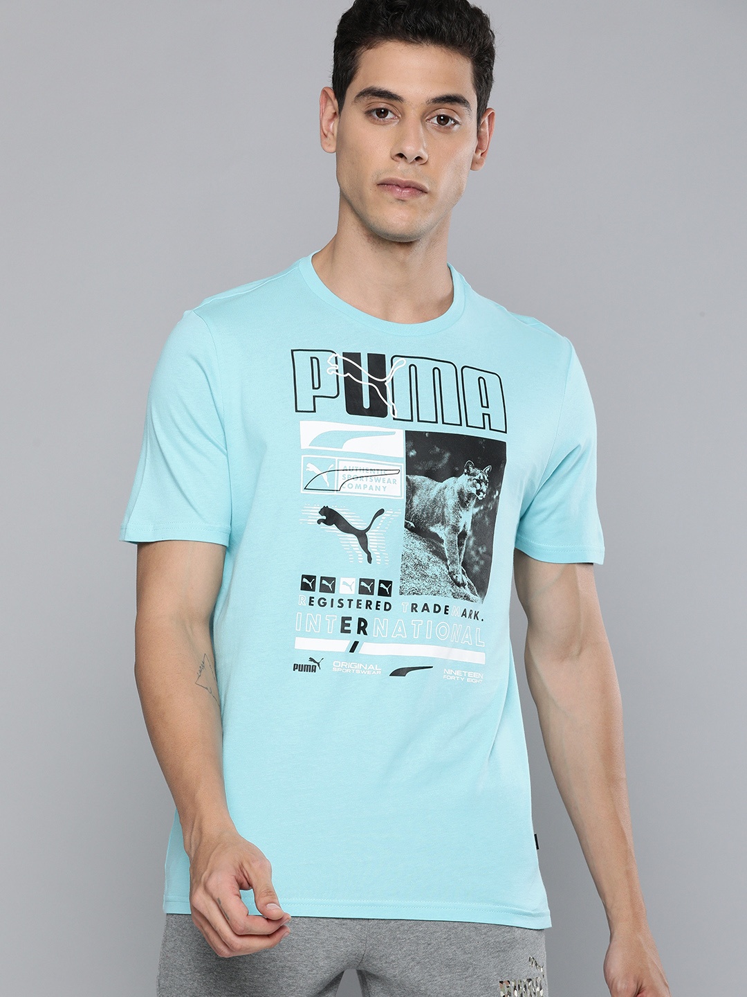 

Puma Men Turquoise Blue Box Printed Round Neck Pure Cotton T-shirt