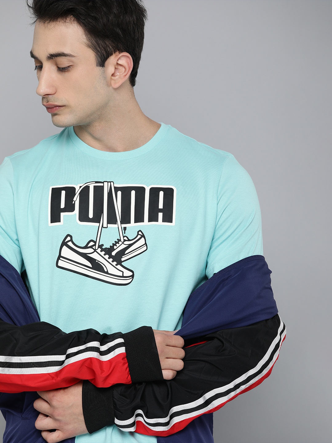 

Puma Men Blue Printed Round Neck Sneaker Inspired Pure Cotton T-shirt