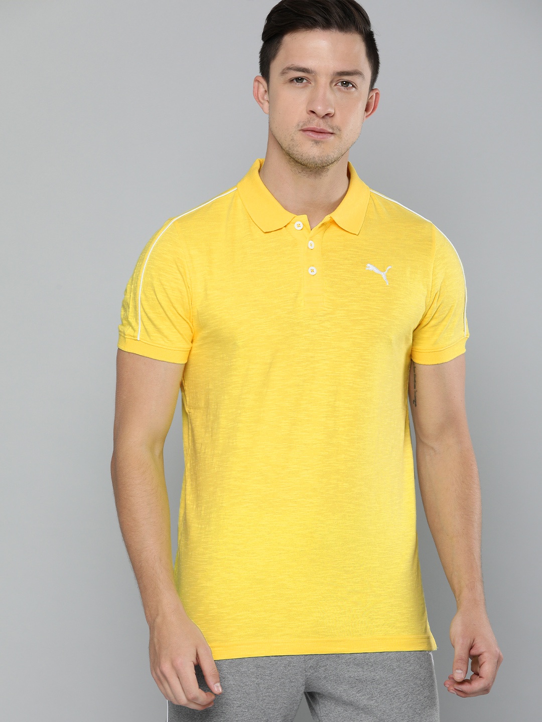 

Puma Men Yellow Solid Slub Jersey Polo Collar Pure Cotton T-shirt