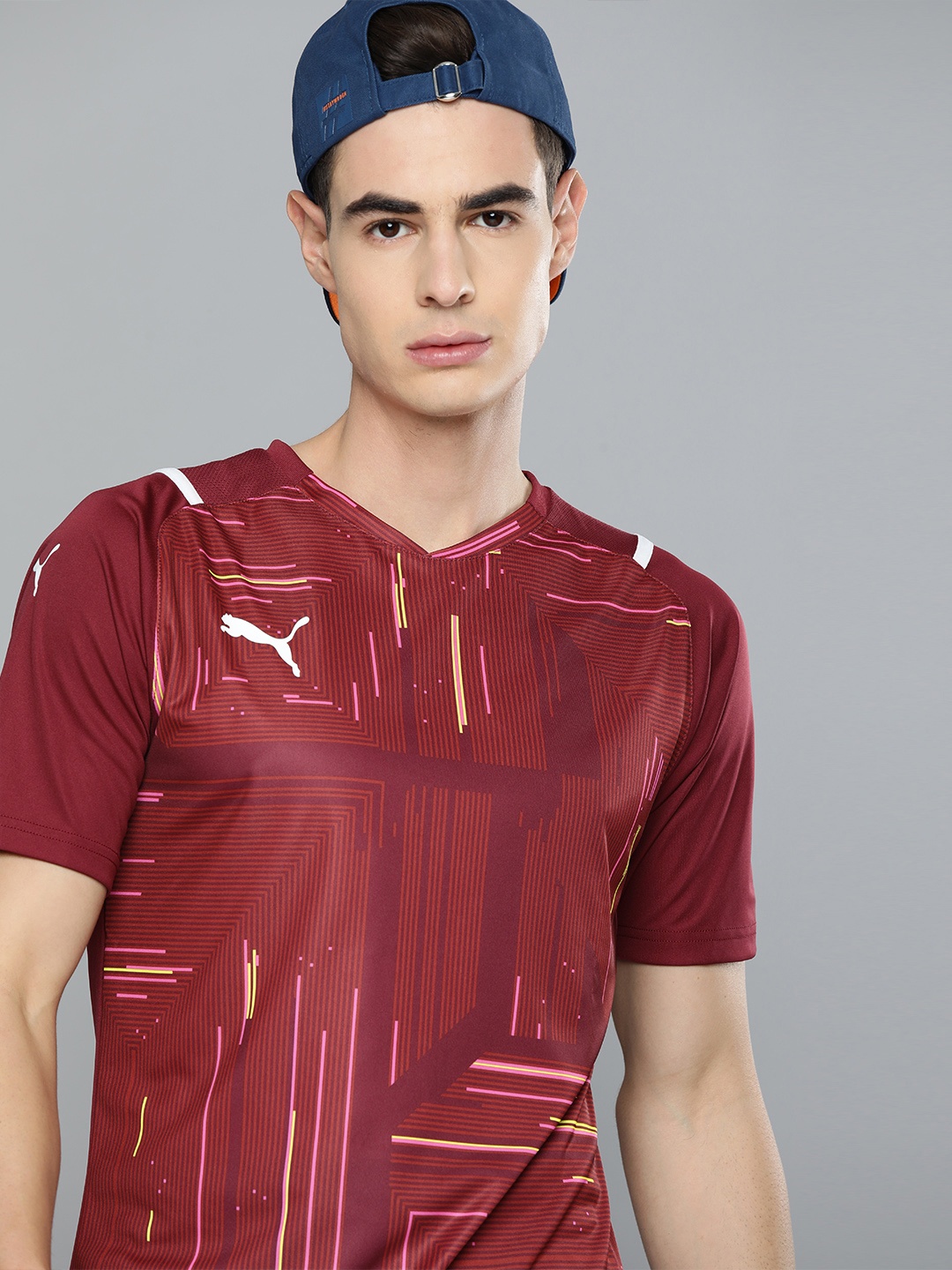 

Puma Men Maroon Printed teamULTIMATE Dry Cell Slim Fit V-Neck T-shirt