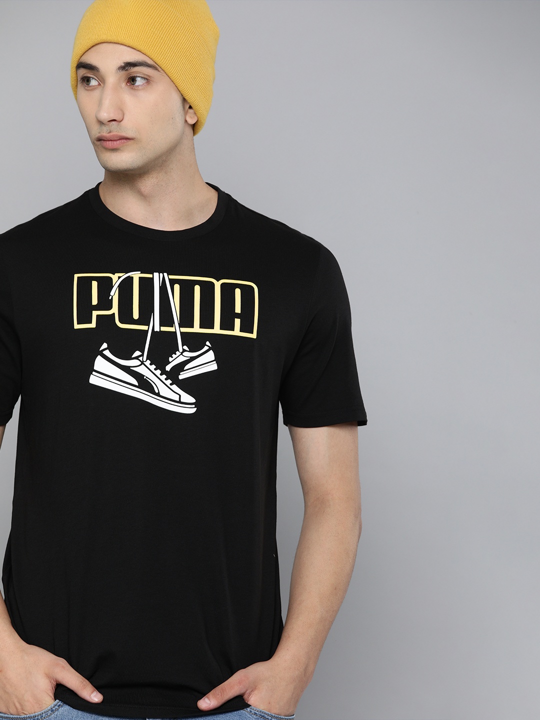 

Puma Men Black Yellow Printed Round Neck Sneaker Inspired Pure Cotton T-shirt