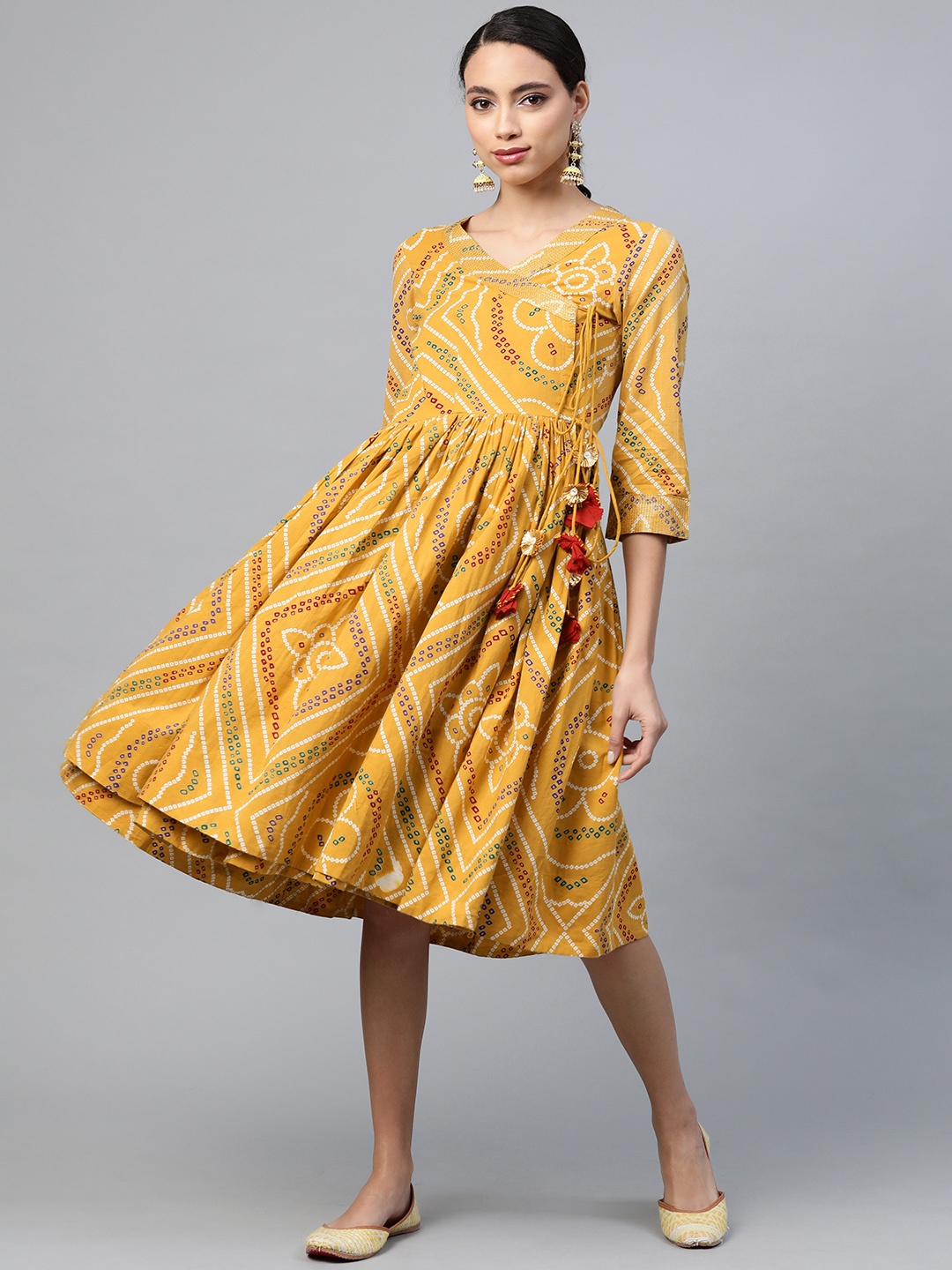 

Anubhutee Mustard Yellow & White Bandhani Printed Pure Cotton Angrakha A-Line Dress