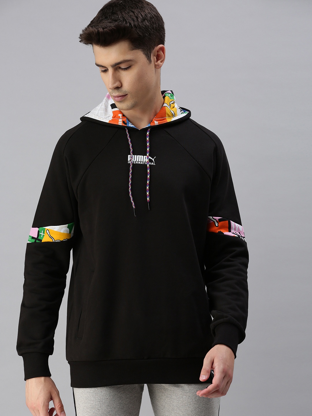 

Puma INTL Men Black Printed Regular Fit Hooded Sweatshirt