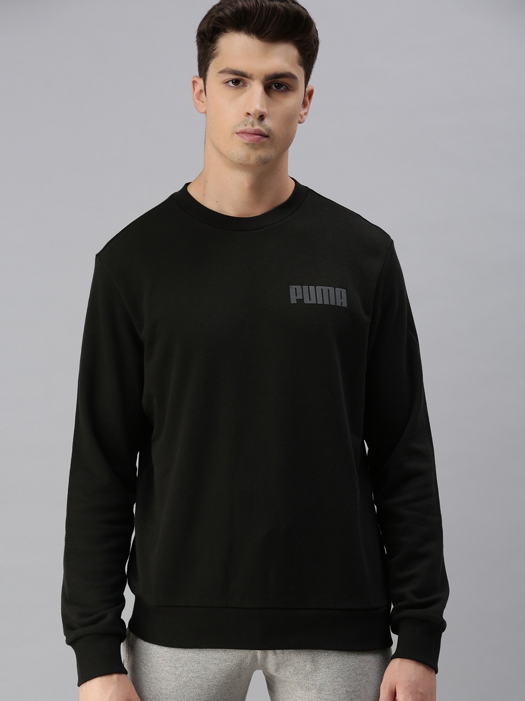 

Puma Men Black MODERN BASICS Solid Sweatshirt