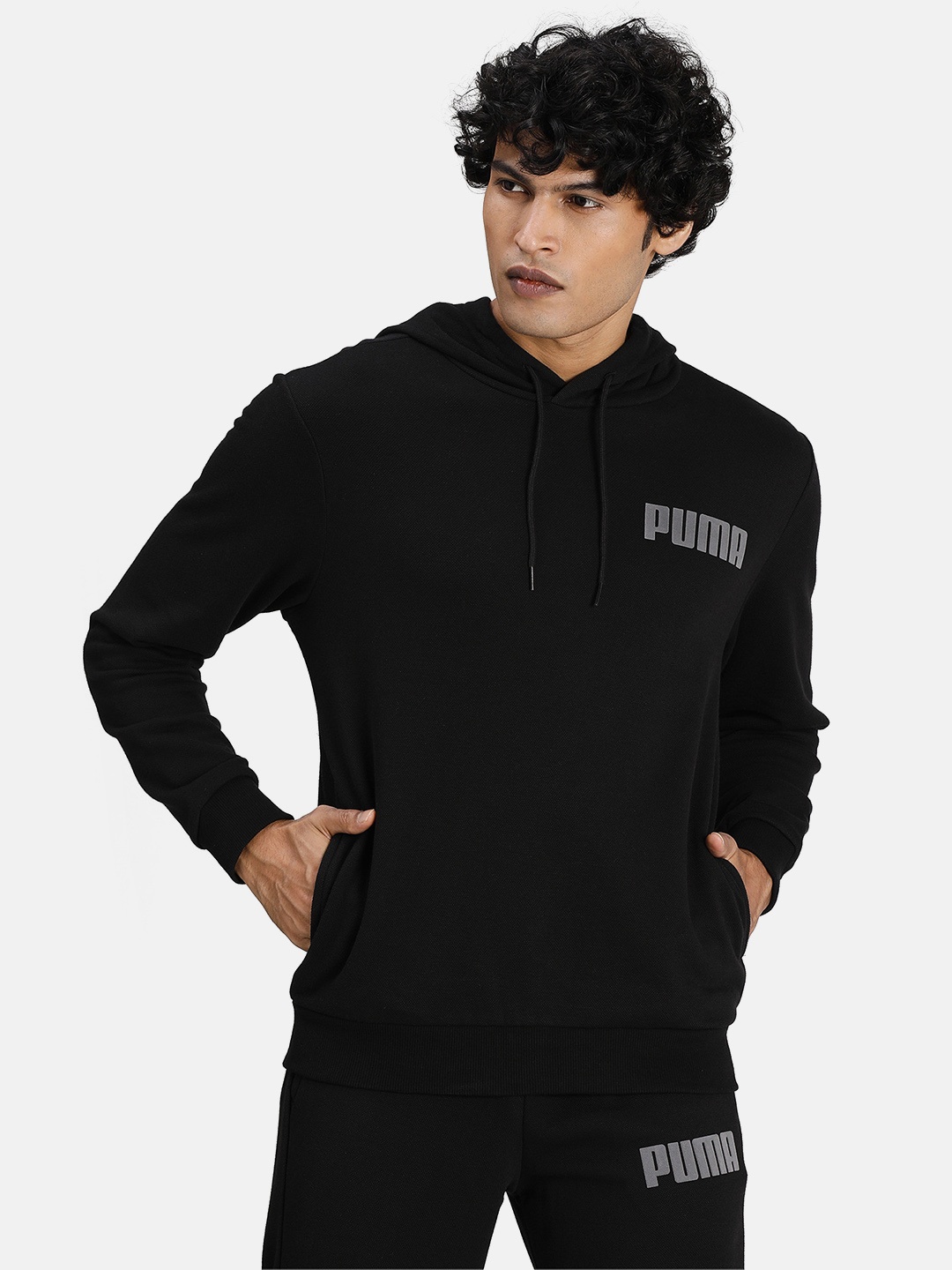 

Puma Men Black Solid MODERN BASICS Hooded Sweatshirt