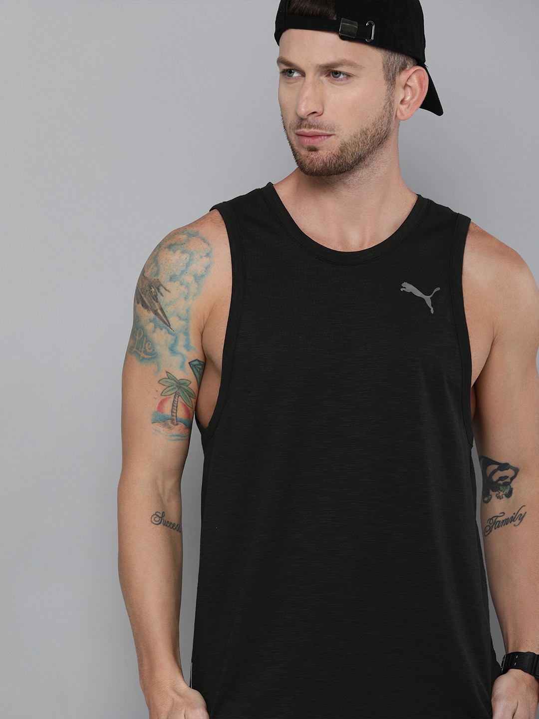 

Puma Men Black Solid Round Neck Train FAV Tank T-shirt