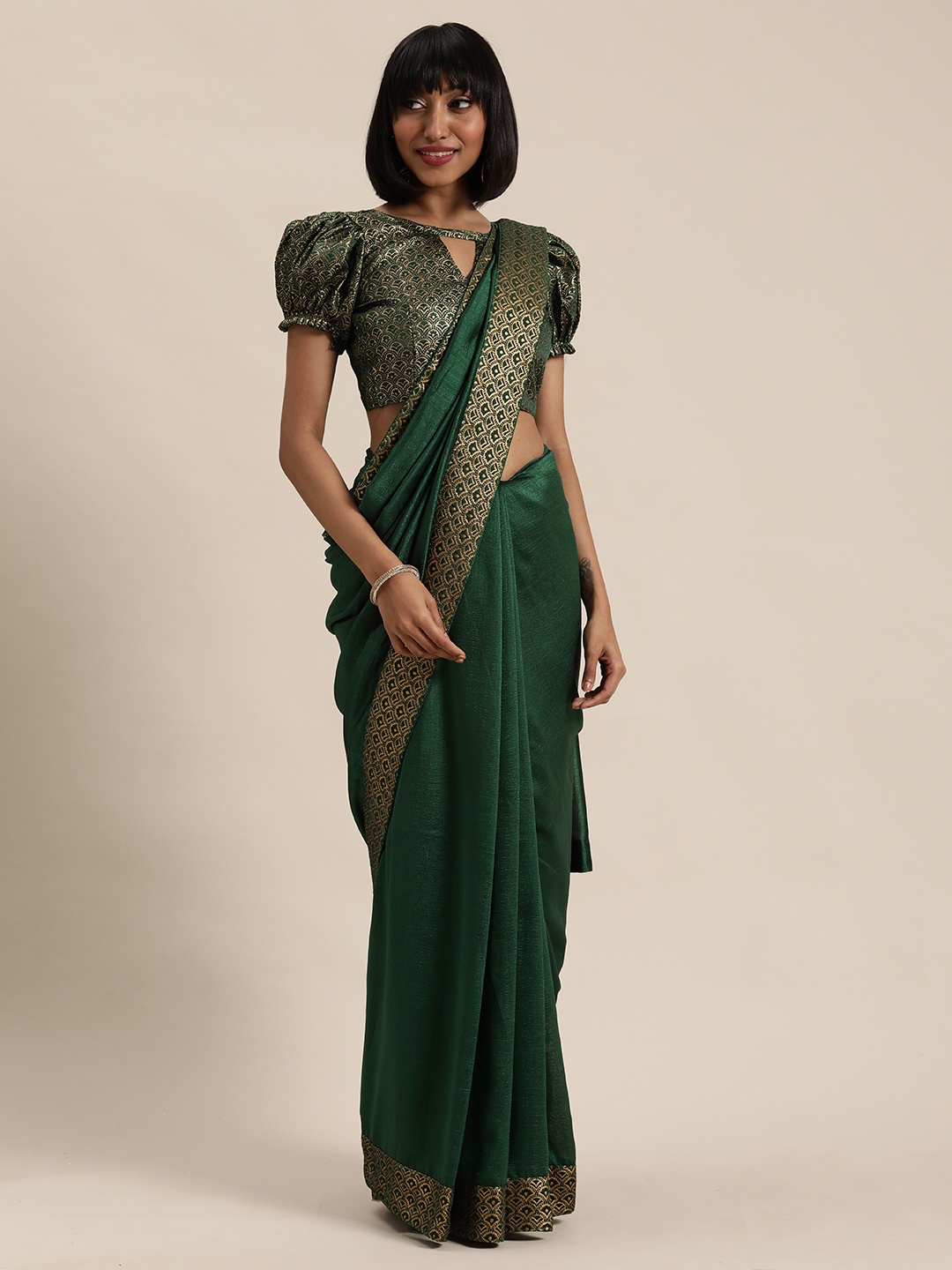 

Mitera Teal Green & Gold-Toned Solid Saree
