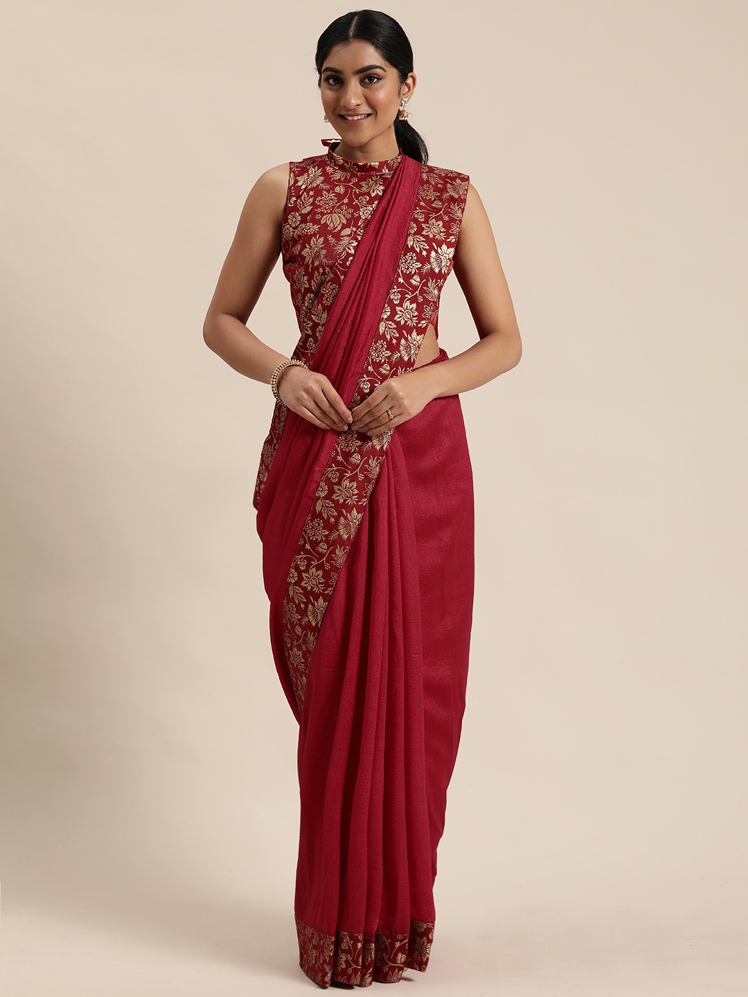 

Mitera Maroon Solid Celebrity Saree