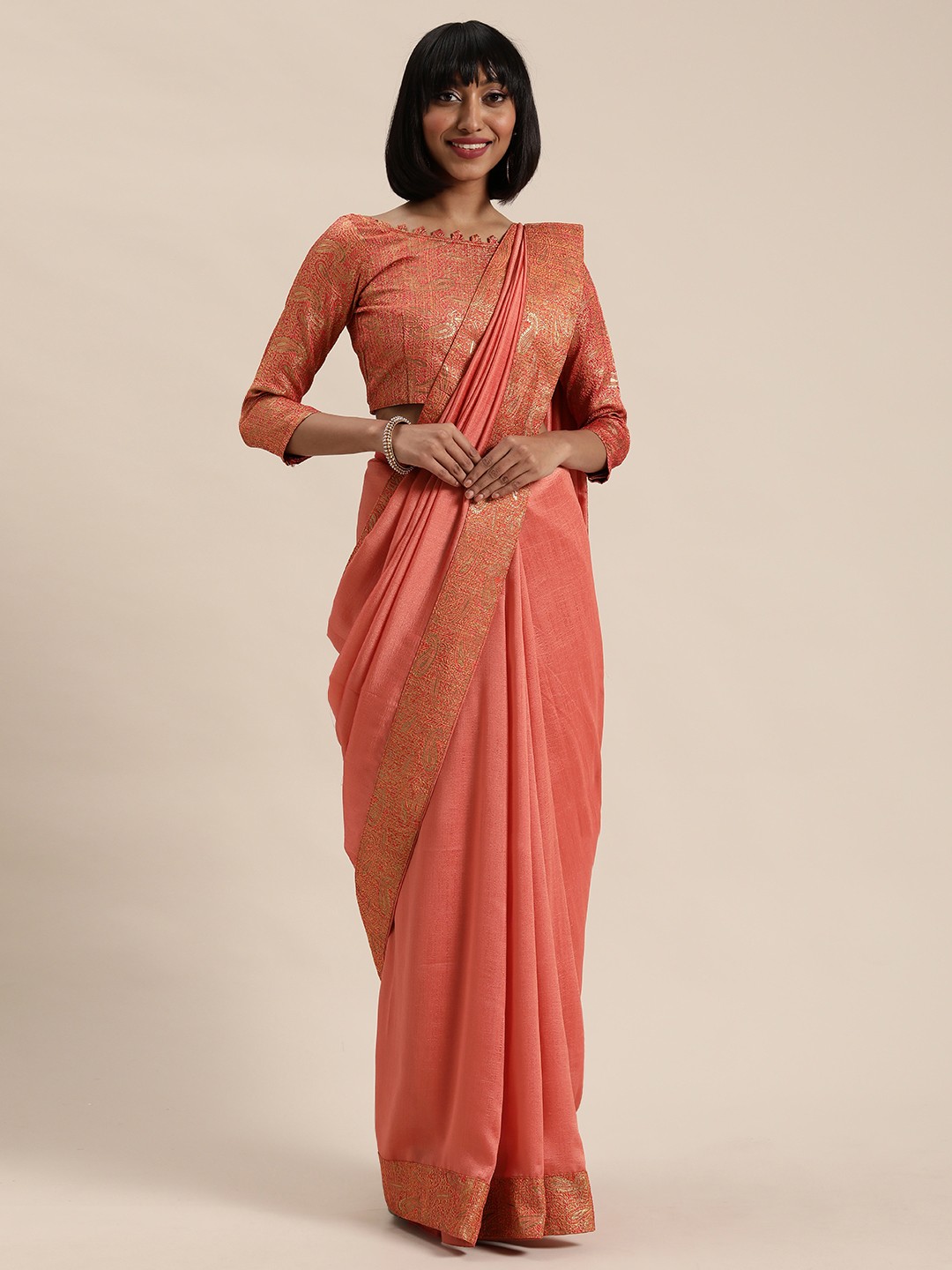 

Mitera Peach-Coloured & Gold-Toned Solid Saree