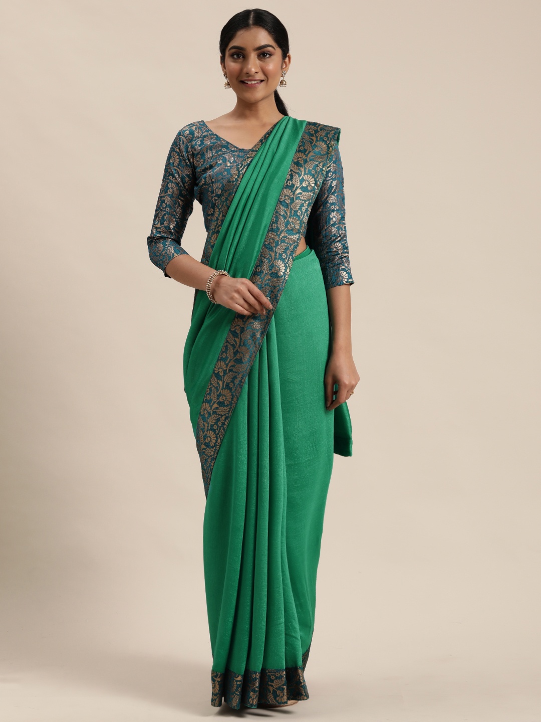 

Mitera Sea Green Solid Celebrity Saree