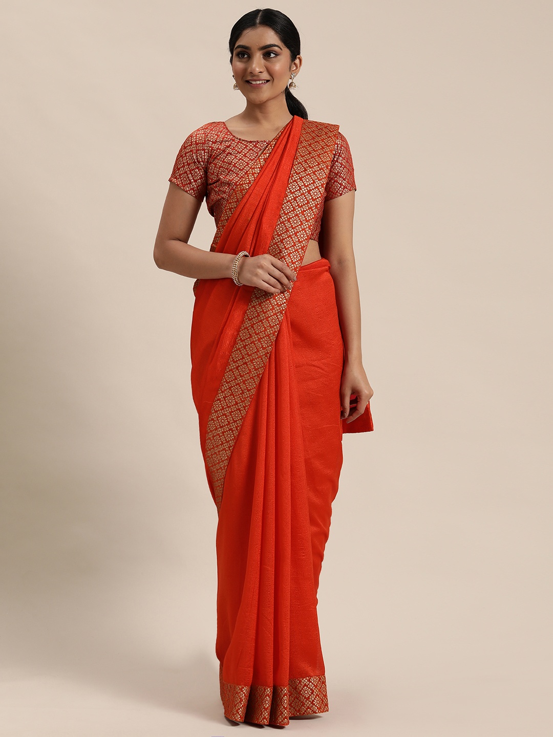 

Mitera Orange Solid Celebrity Saree