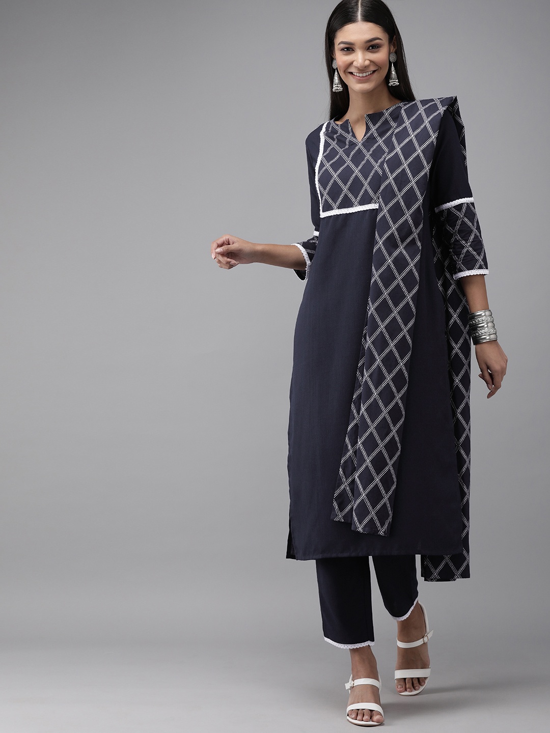 

Indo Era Women Navy Blue & White Yoke Design Kurta with Trousers & Dupatta
