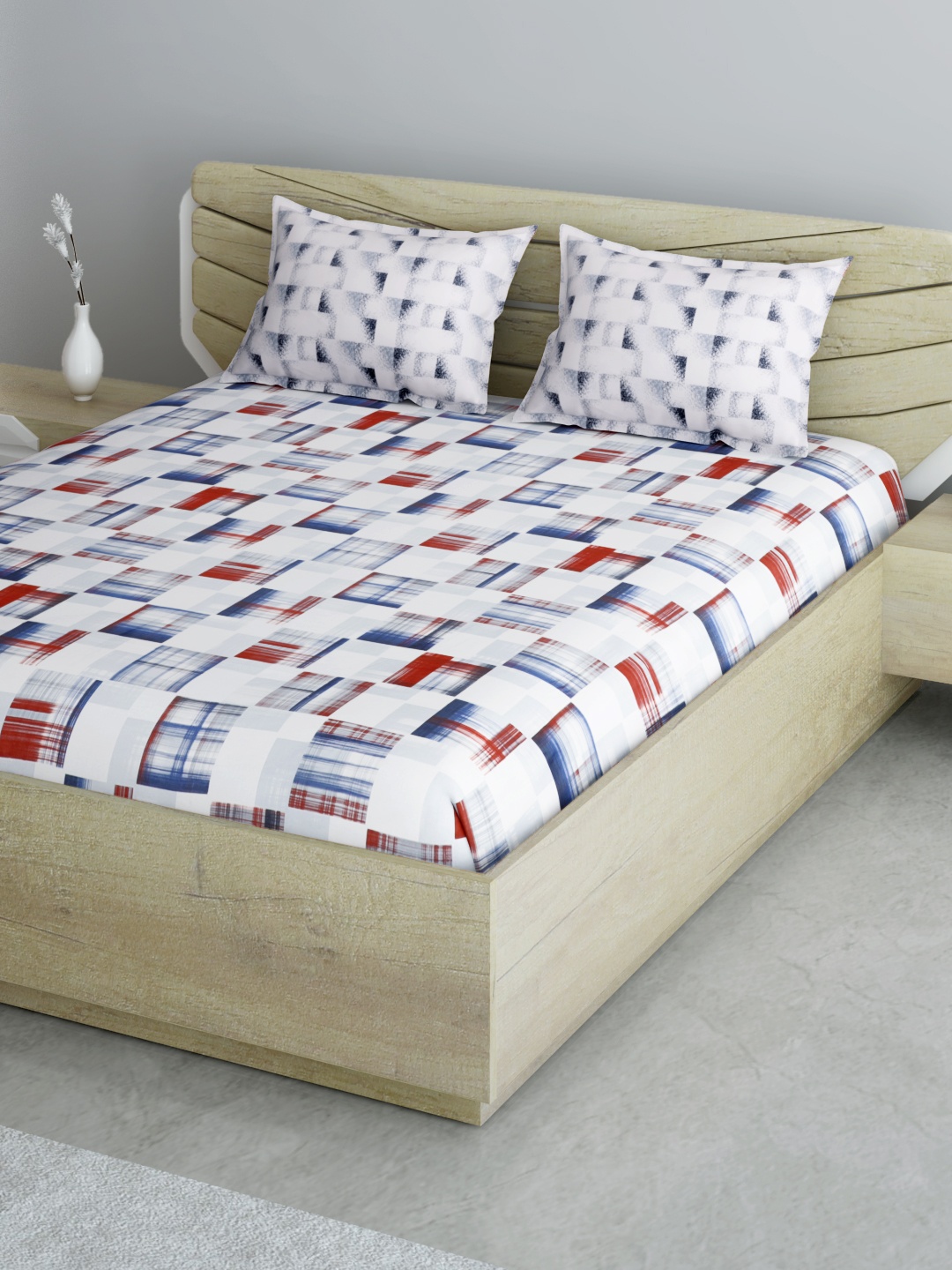 

Aura White & Blue Geometric 144 TC Cotton 1 Queen Bedsheet with 2 Pillow Covers