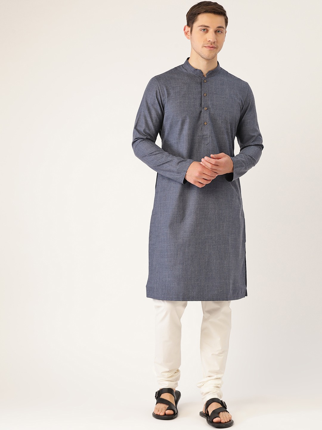 

Manyavar Men Blue Solid Straight Kurta