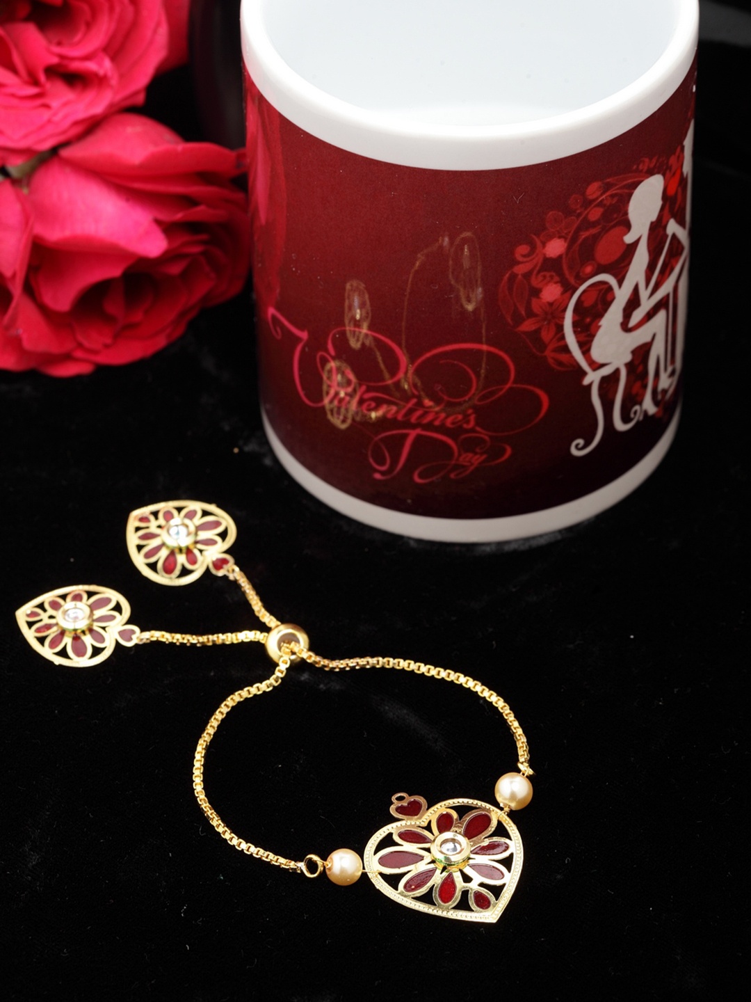 

PANASH Gold-Plated Heart Shaped Handcrafted Kundan Bracelet With Magic Mug