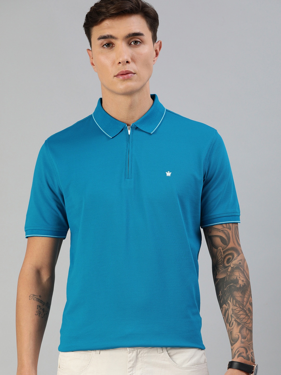 

Louis Philippe Men Blue Solid Polo Collar T-shirt