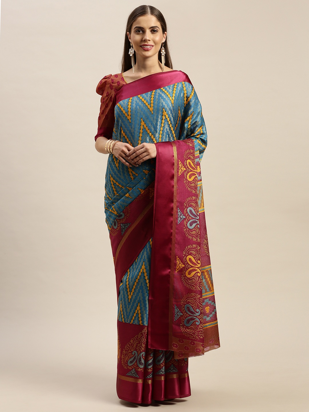 

Rajnandini Turquoise Blue & Burgundy Silk Cotton Printed Kota Saree