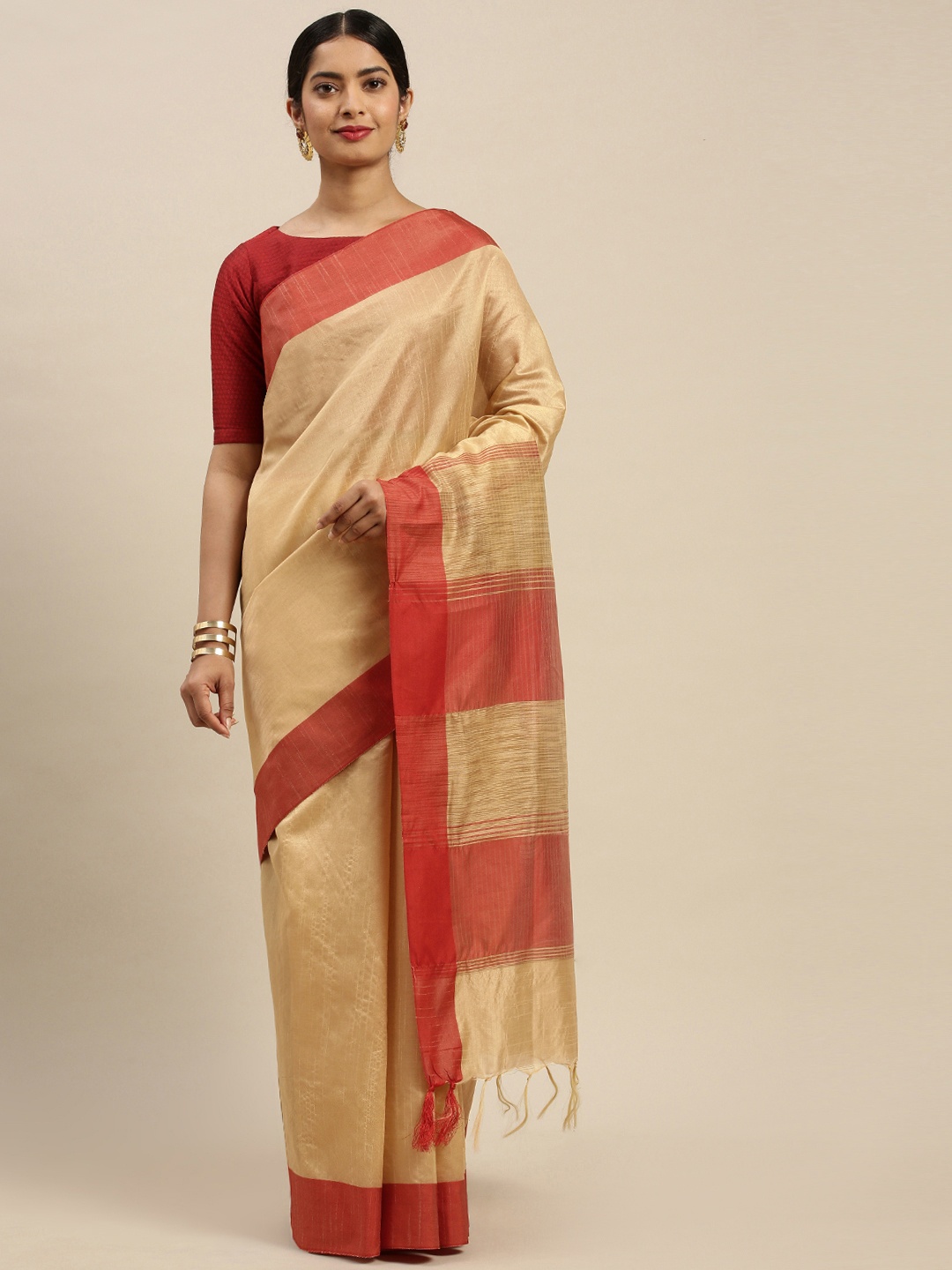 

Rajnandini Beige Solid Saree