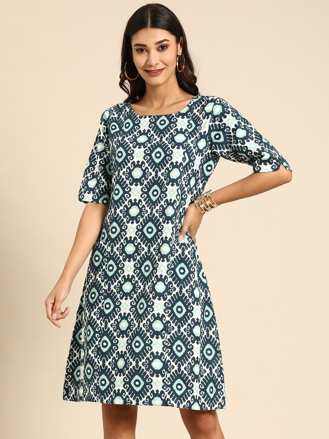 

Varanga Women White & Teal Blue Printed A-Line Panelled Dress with Pockets