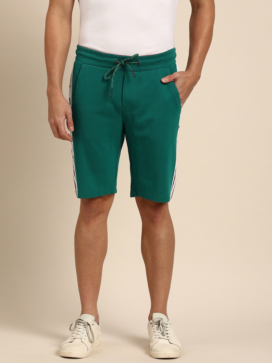 

Being Human Men Solid Pure Cotton Shorts With Side Stripe Details, Green