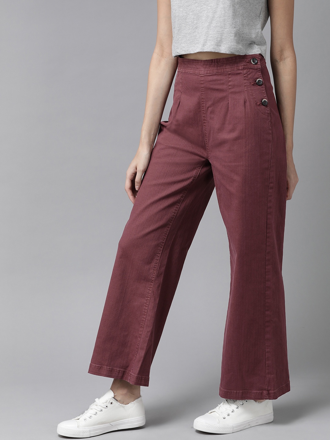 

The Roadster Lifestyle Co Women Burgundy Flared Solid High-Waisted Bootcut Trousers