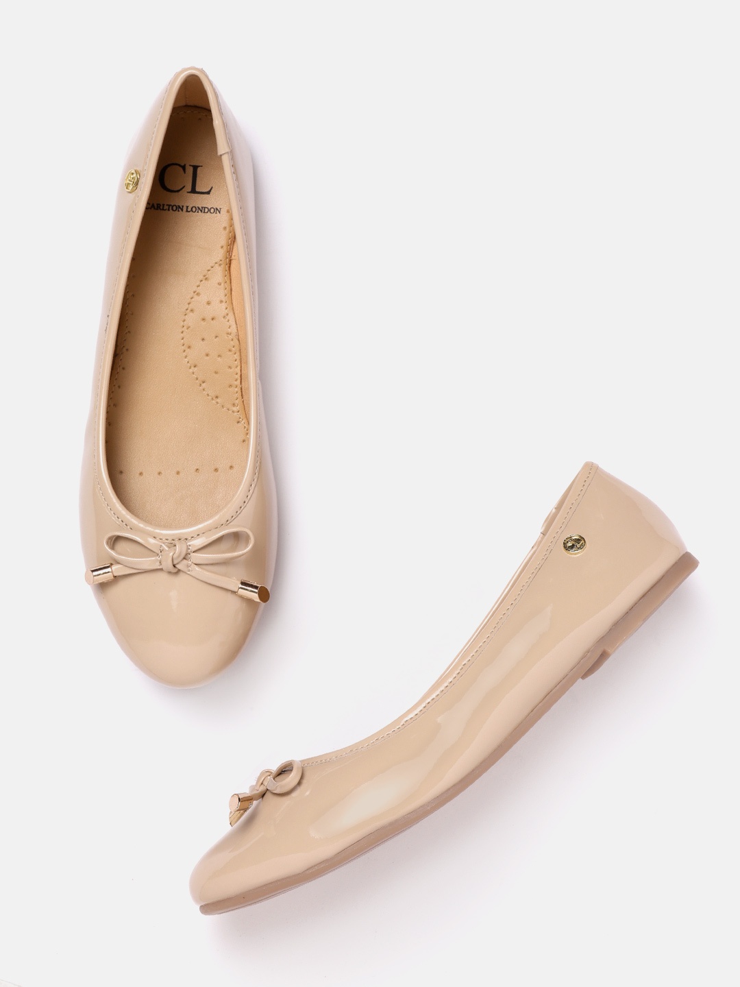 

Carlton London Women Beige Solid Patent Finish Ballerinas