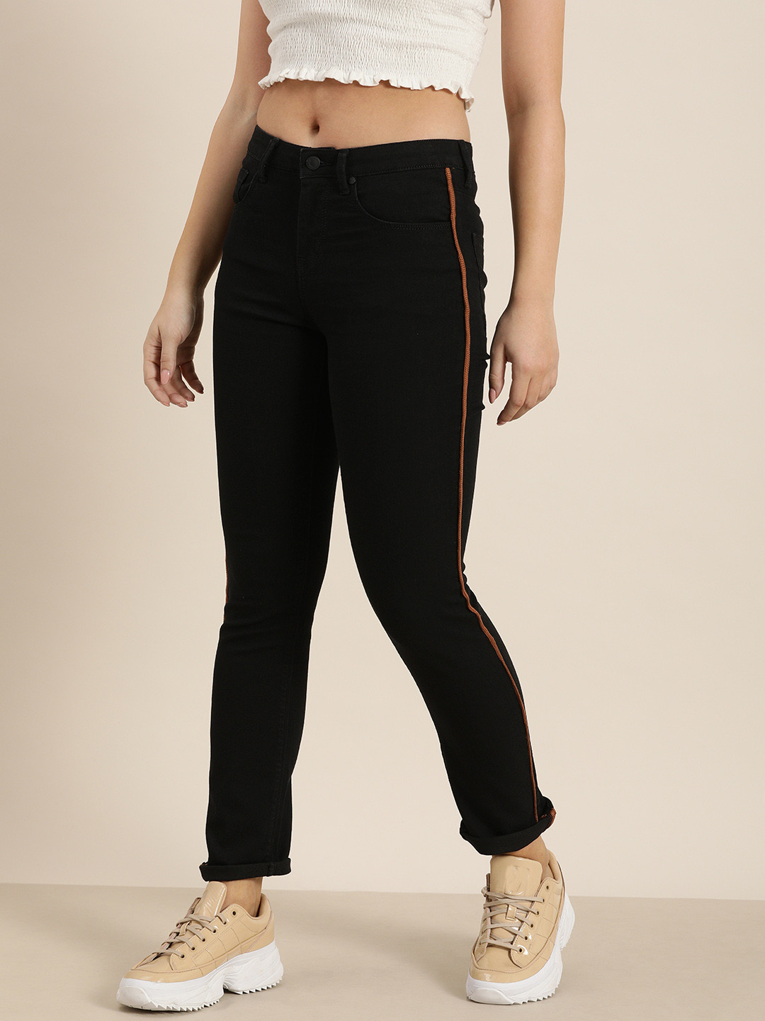 

Moda Rapido Women Black Slim Fit Mid-Rise Clean Look Stretchable Jeans With Side Stripe