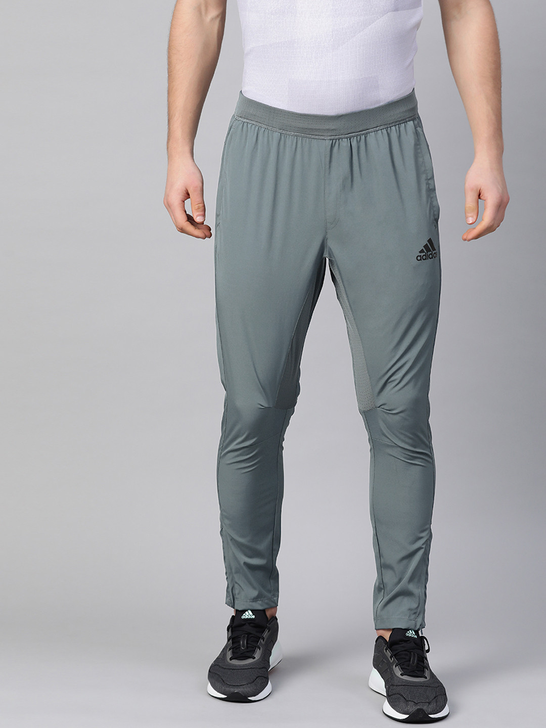 

ADIDAS Men Grey Solid City Base Woven Track Pants