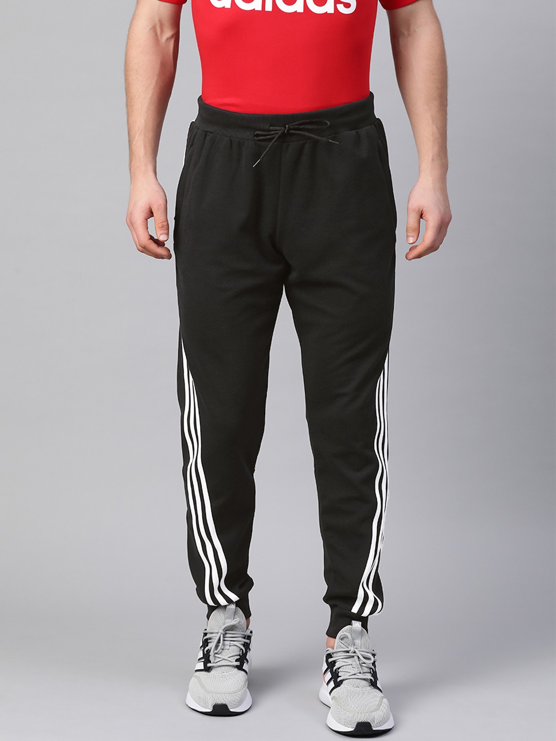 

ADIDAS Men Black Solid Joggers With Side Stripe