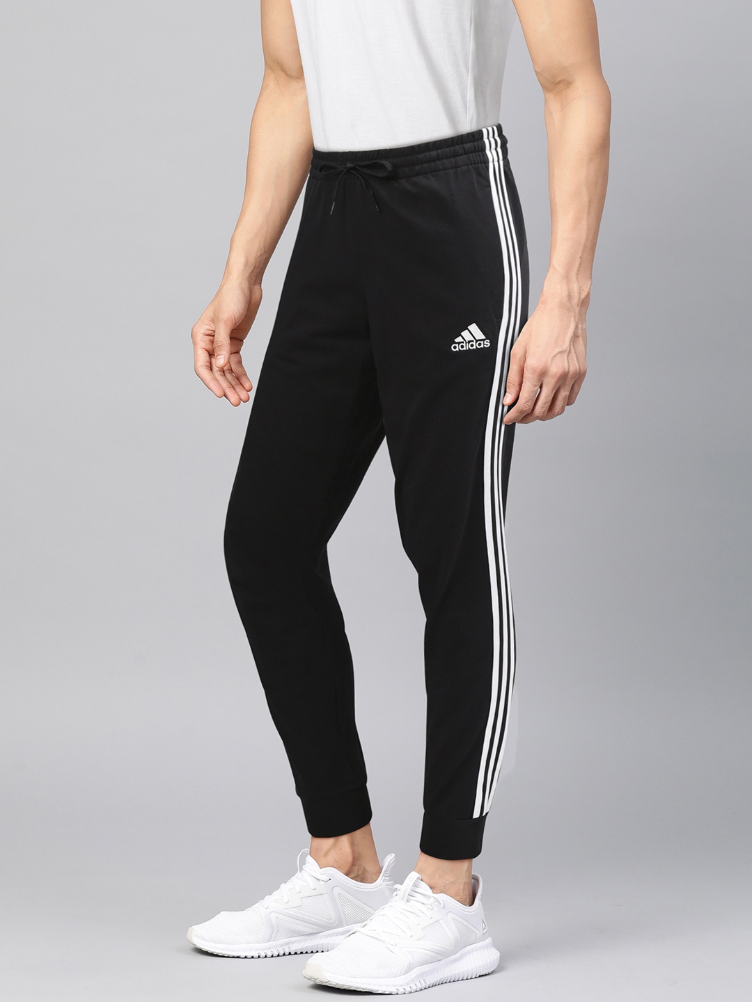 

ADIDAS Men Black 3 Stripes FT TC Solid Track Pants