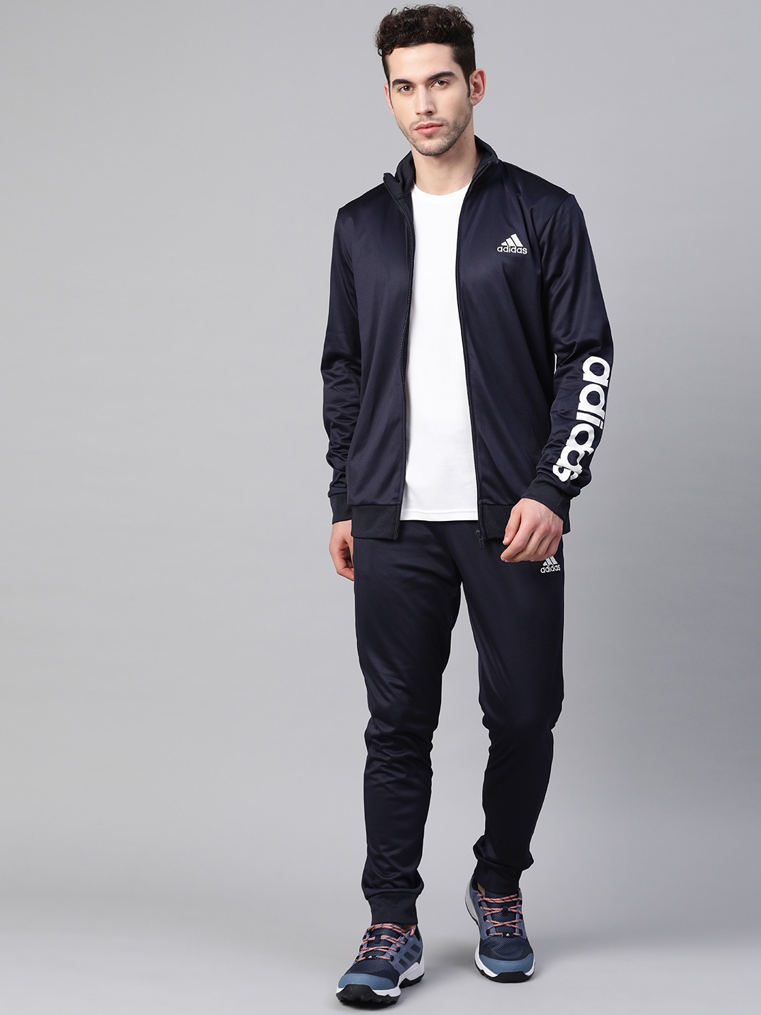 

Adidas Men Navy Blue Solid Knitted Tracksuit