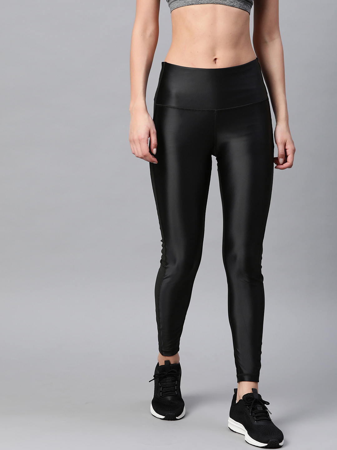 

Reebok Women Black Solid Studio Shiny High-Rise Tights
