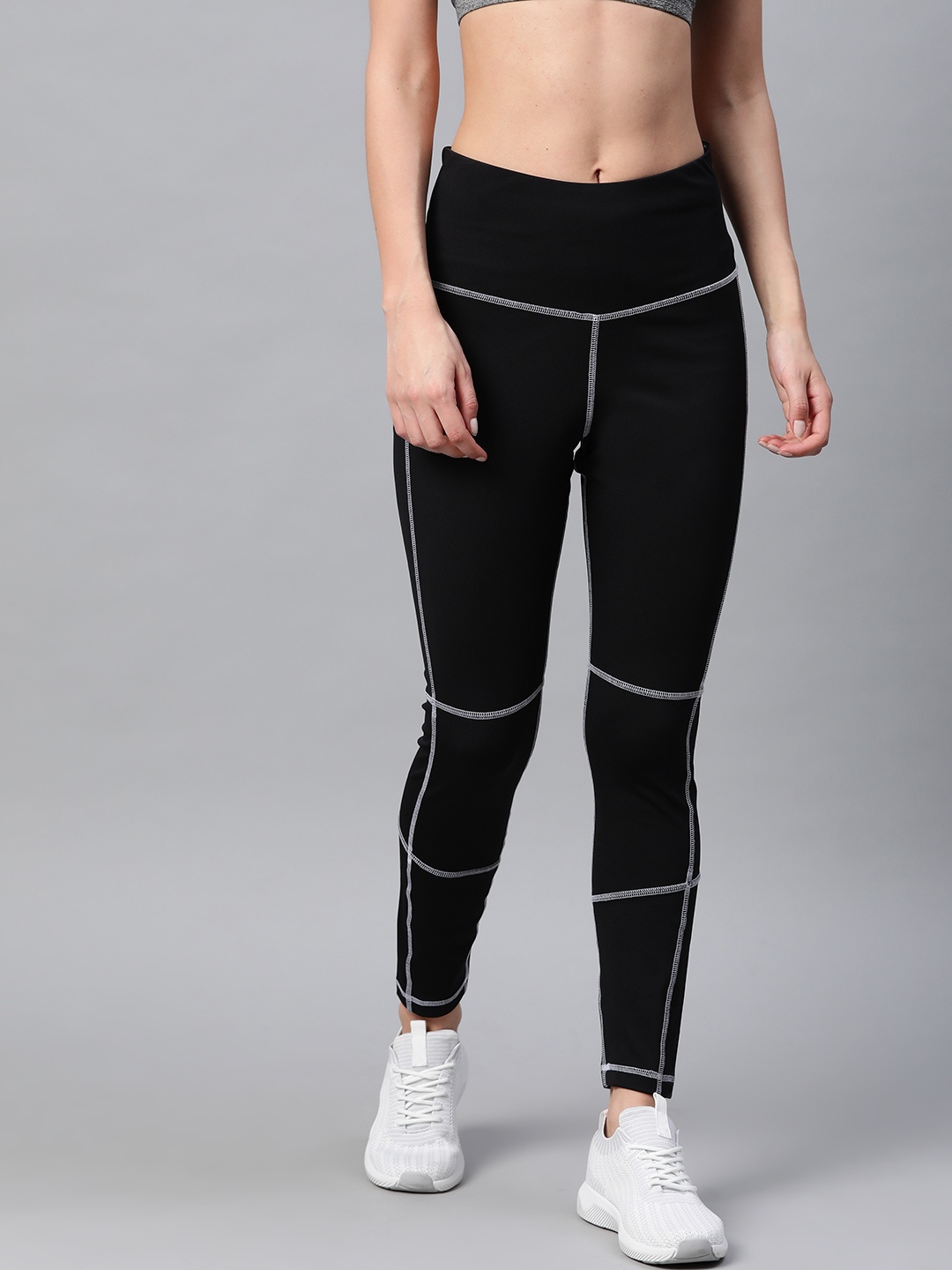 

Reebok Women Black Solid WOR Detail HR 7/8 Tights