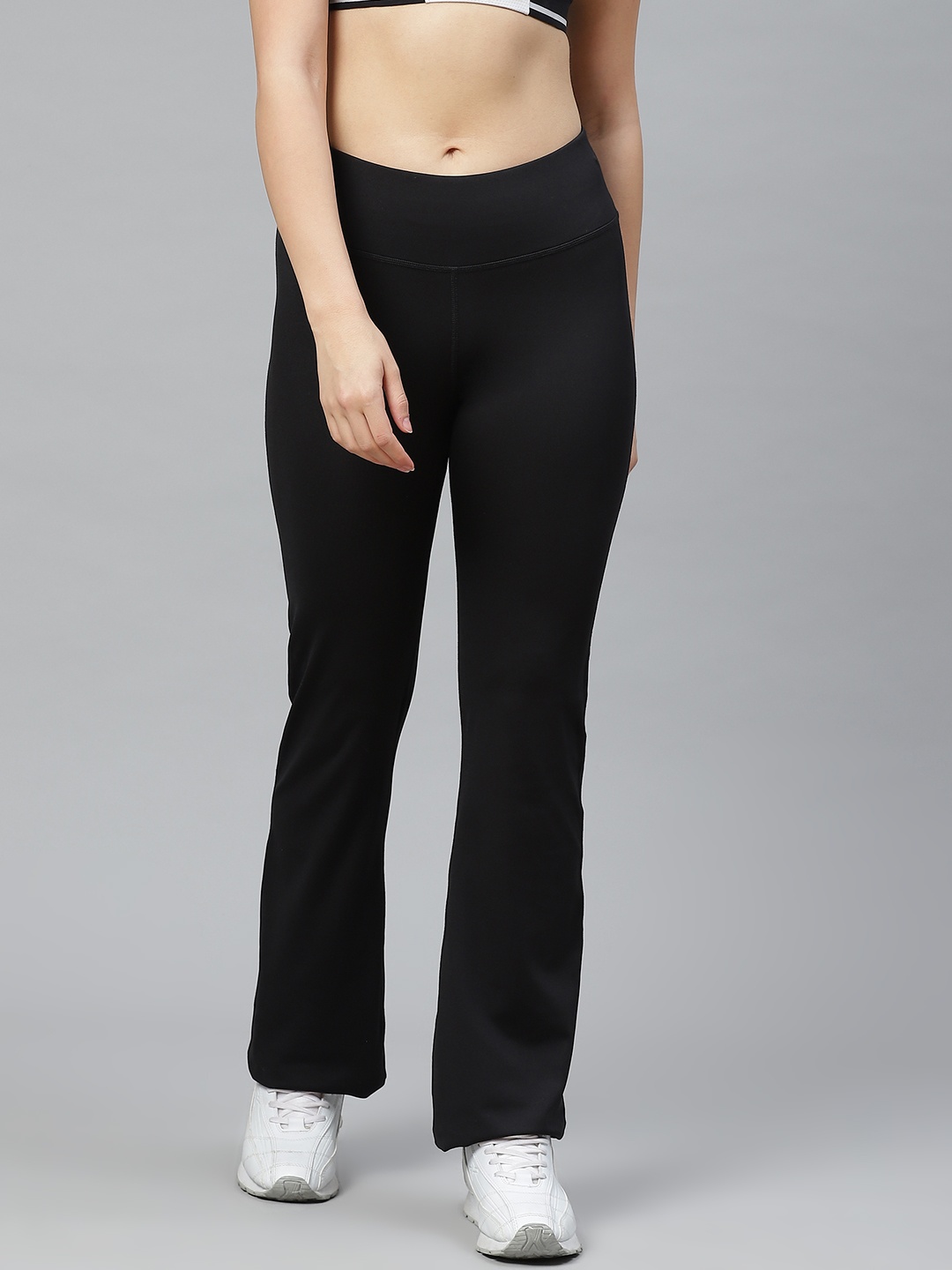 

Reebok Women Black Solid Workout PP Bootcut Training Track Pants