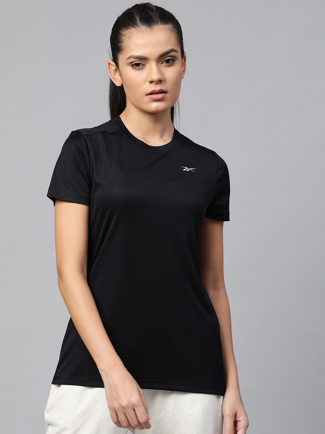 

Reebok Women Black Basic Solid Slim Fit Running T-shirt
