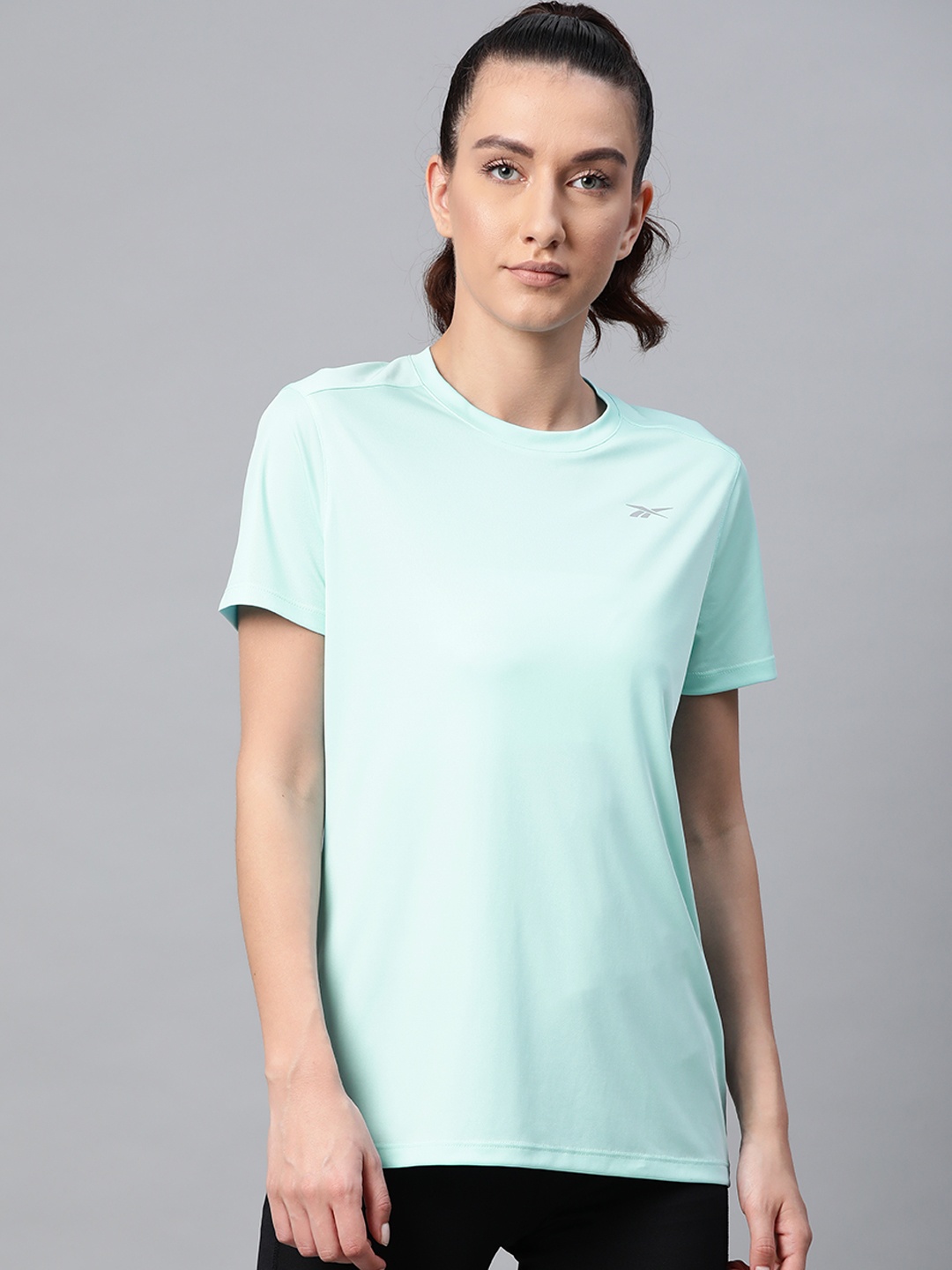 

Reebok Women Blue Solid Run Essentials Slim Fit T-shirt