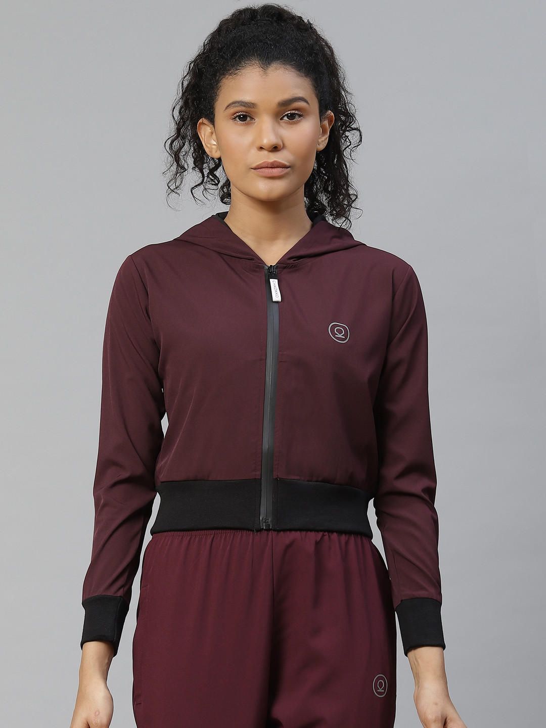 

Chkokko Women Burgundy Solid Hooded Crop Sporty Jacket
